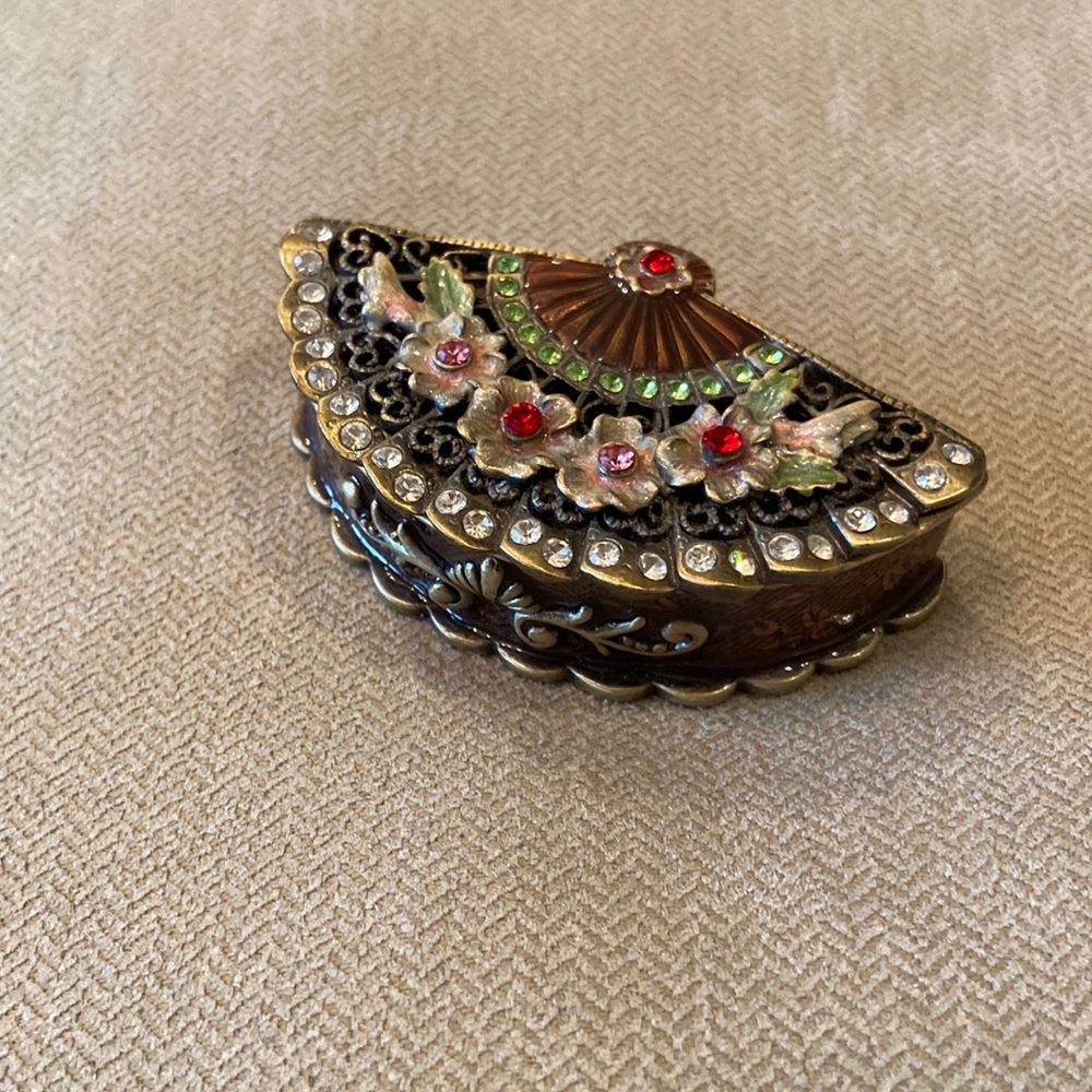 Vintage miniature ornate metal trinket box with magnetic lid.